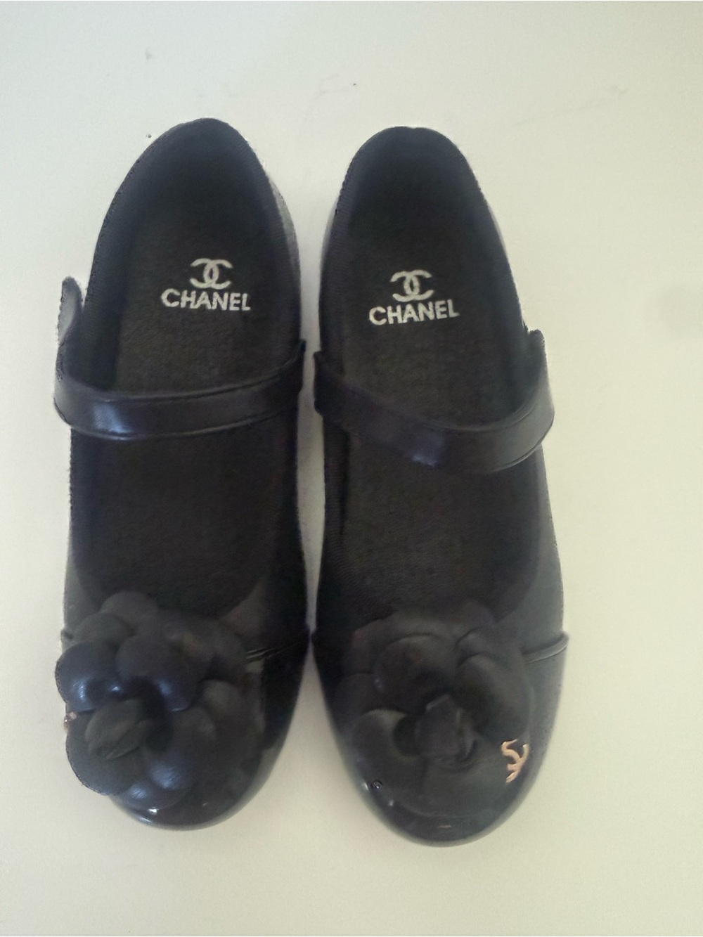 CHANEL Black Camellia-Strap Mary Jane Flats